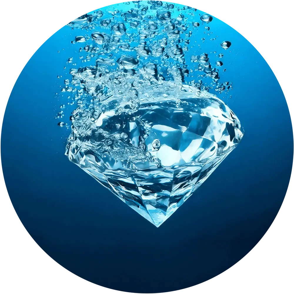 Ein großer Diamant ist von sprudelndem Wasser umgeben.